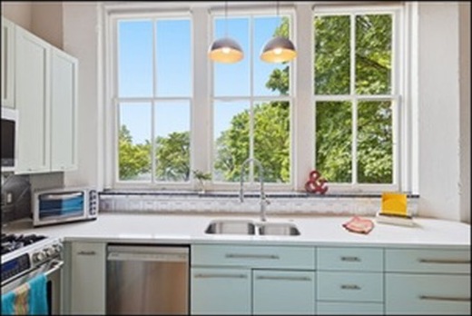 Kitchen sink under the big windows