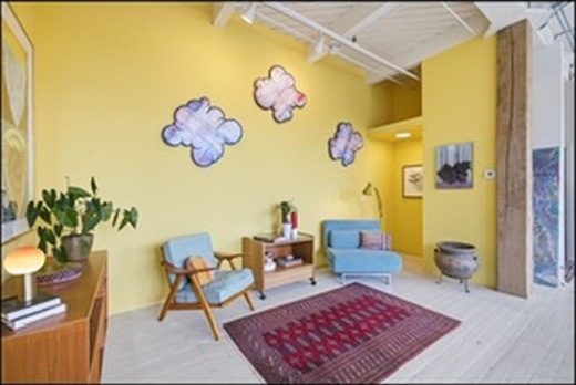 Yellow living room, wide view